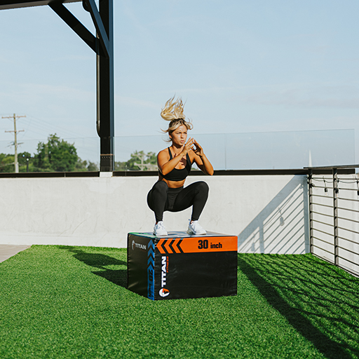 Person jumping on a plyobox